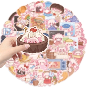 Gros plan d'un autocollant axolotl rose avec un ensemble de stickers flous en arrière-plan