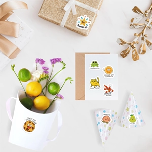 Various cute cartoon reward stickers applied on gift boxes and party decorations