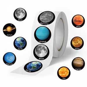 Roll of 500 solar system planet stickers including Earth and Mars for scrapbooking