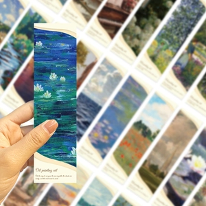 Close-up of artistic oil painting bookmarks featuring Monet style water lilies and nature