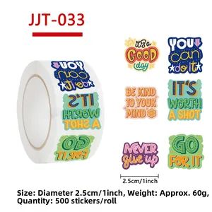 Macro detail of 500 motivational text stickers per roll for gift wrapping and envelopes