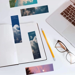 Artistic moon phase bookmarks featuring celestial sky photography and poetic English text