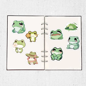 Set of 7 cute green frog stickers with diverse expressions for laptops and luggage decoration