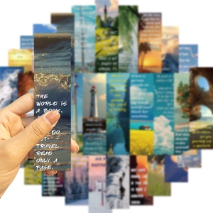 Close-up of scenic landscape bookmarks with English quotes for journaling decoration