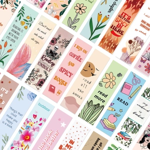 Detailed flat lay of diverse creative paper bookmarks with floral and quote designs