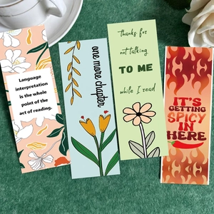 Artistic paper bookmarks featuring vintage floral designs and inspirational reading quotes