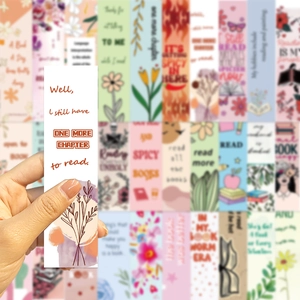 Minimalist paper bookmark set with floral patterns and motivational reading quotes