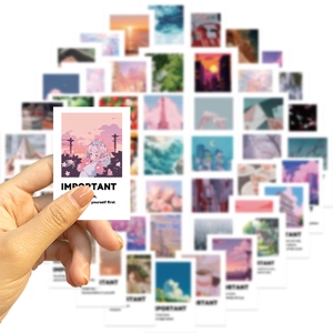 Detail of Polaroid style stickers with anime illustrations and inspirational English quotes