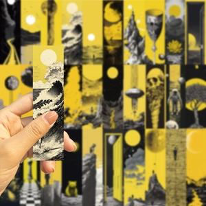Artistic paper bookmarks featuring surreal sun yellow and black illustrations of ocean waves