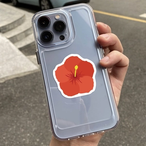 Close-up of a clear protective case featuring a vibrant red hibiscus flower design on a phone