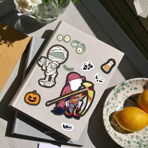 Set de stickers d'Halloween avec momie et citrouille sur un carnet créatif