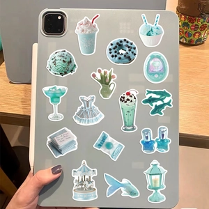 Mint green waterproof stickers shown applied to a tablet for creative DIY decoration