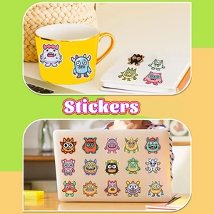 Detail of colorful cartoon monster stickers applied to a yellow mug and laptop cover
