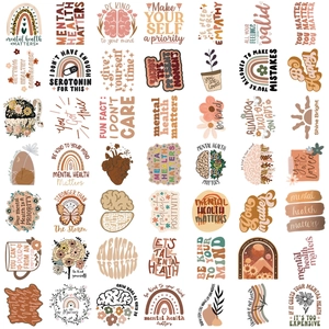Close-up of 50 mental health stickers with bohemian rainbow and floral designs