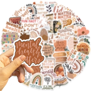 Macro detail of waterproof mental health stickers for guitars and laptops