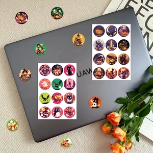 Halloween pumpkin and ghost round stickers set on a laptop with floral decor