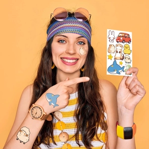Cartoon temporary tattoos for kids featuring colorful animals and cars on bright background