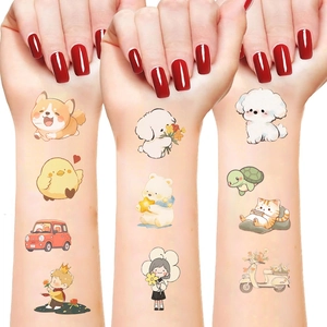 Close-up of colorful cartoon animal temporary tattoos applied on arms for party