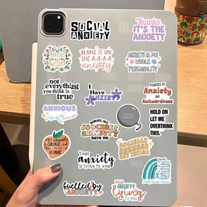 Waterproof anxiety awareness stickers displayed on a tablet back with pastel colors