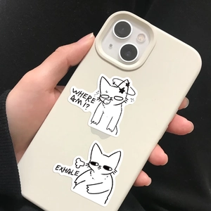 Detail of cream silicone phone case with cartoon cat graphics and humorous text