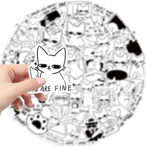 Macro shot of a waterproof black and white cat sticker with You Are Fine quote design