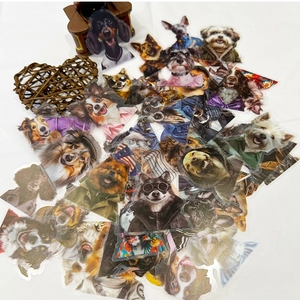Macro view of assorted waterproof dog stickers with fashionable human-like clothing items