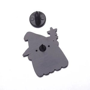 Detail view of the back of a ghost enamel pin with a black rubber clutch closure