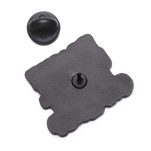 Detailed macro view of the black matte enamel pin back with rubber clutch fastener