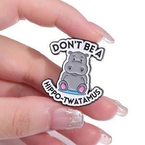 Cartoon hippo enamel pin badge with funny text Don't be a Hippo-twatamus slogan