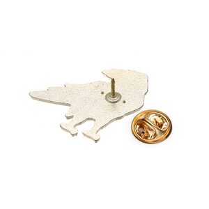 Detail of metal crow brooch back with secure butterfly clutch and frosted alloy finish