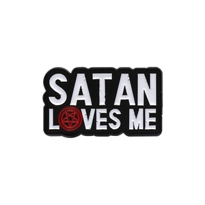 Minimalist enamel pin badge featuring Satan Loves Me text with a red pentagram star