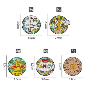 Detail view of colorful round enamel animal pins with specific diameter measurements