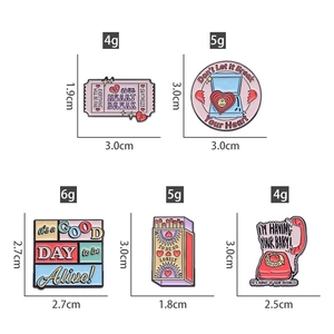 Detailed view of enamel badges showing various creative shapes and dimensions for lapel pins