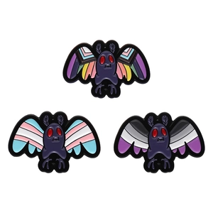 Halloween moth enamel pins set with colorful striped wings and red eye details