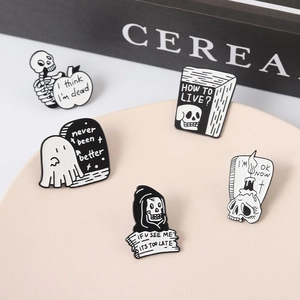 5-piece set of dark punk style black and white enamel pins with skeleton motifs