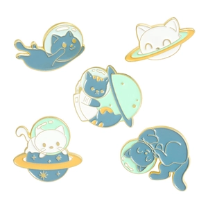 Set of 5 cartoon space cat enamel pins with blue universe and planet designs