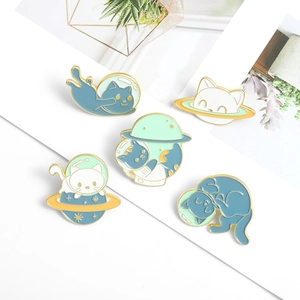 Five-piece set of blue astronaut cat enamel pins with planet and UFO motifs