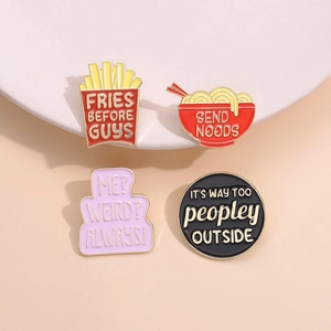 Set of 4 creative enamel pins featuring fries and noodle shapes with humorous quotes