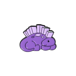 Close-up of purple enamel dinosaur brooch with gradient plates and black alloy edges