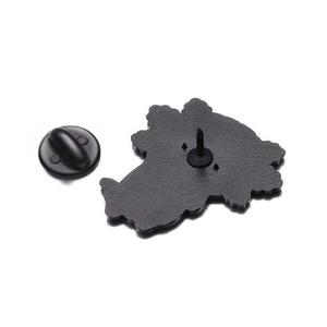 Detail view of the matte black enamel pin back with durable rubber clasp and secure needle