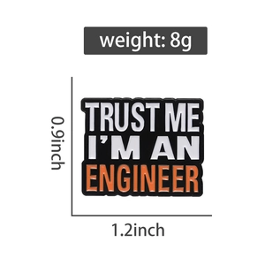 Detail of square enamel engineer pin measuring 0.9 x 1.2 inches with 8g weight specs