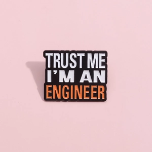 Minimalist enamel pin Trust Me I'm An Engineer metal badge on pink background