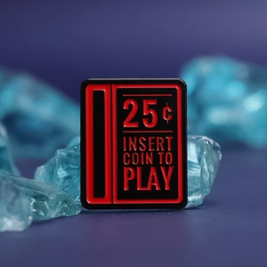 Retro arcade machine pin with 25 cents insert coin to play text in black and red enamel