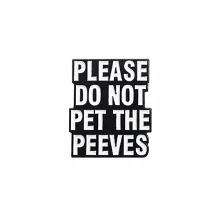Black enamel rectangle brooch with white text PLEASE DO NOT PET THE PEEVES 3.0x2.4cm