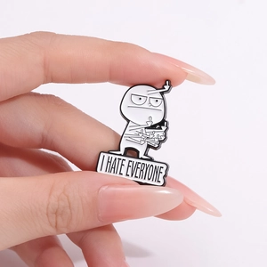 Funny cartoon character enamel pin with I HATE EVERYONE text and gesture design