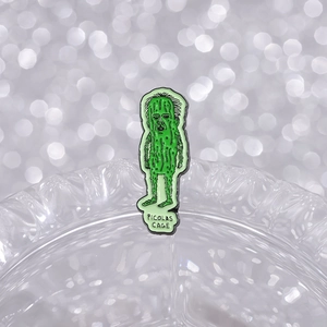 Creative green pickle enamel pin with Nicolas Cage face and Picolas Cage text