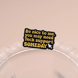 Funny tech support enamel pin with yellow text on black background and mouse cursor icon
