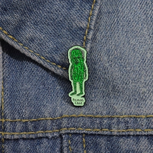 Funny green cactus Picolas Cage enamel pin on blue denim jacket for creative decoration