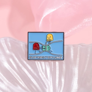 Cartoon Ohm's Law physics enamel pin featuring Volt, Amp, and Ohm on a shell background