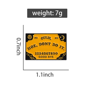 Détails du pin's émaillé Ouija avec dimensions 1,1x0,7 pouces et poids de 7 grammes